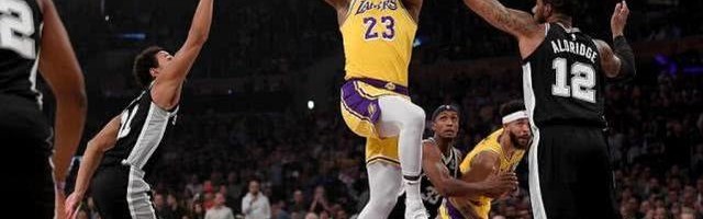  詹姆斯三双助湖人险胜马刺  